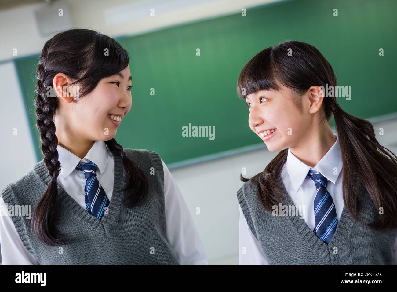 Junior high school girls who get along well with each other Stock Photo Junior high school girls who get along well with each other Stock Photo