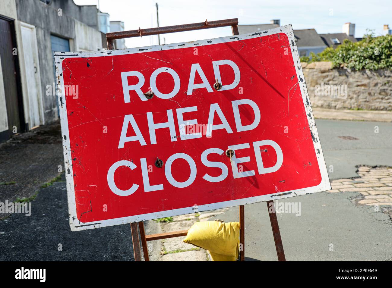 Road Ahead Closed sign from a utility company making essential upgrades