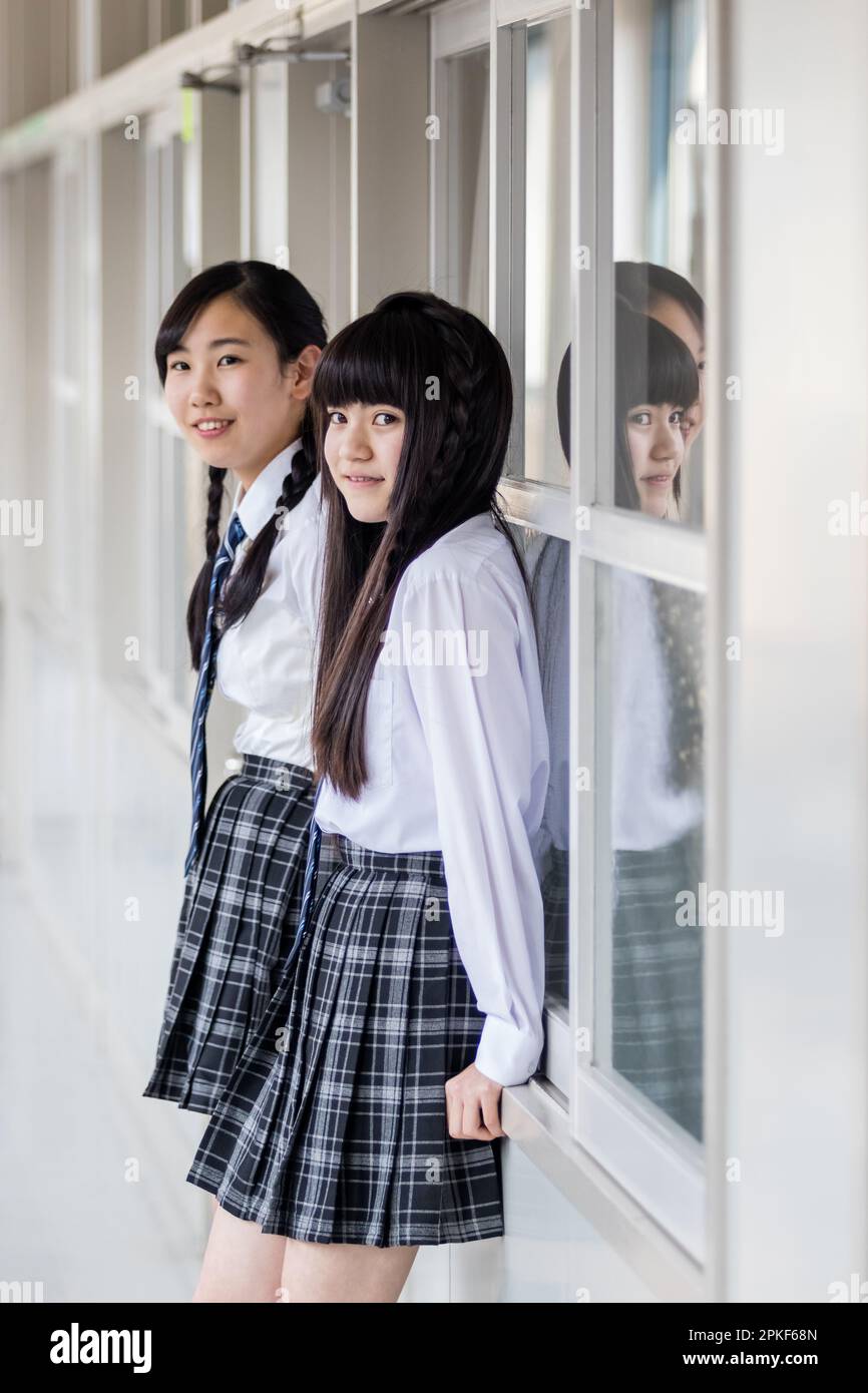 Junior high school girls in a classroom Stock Photo