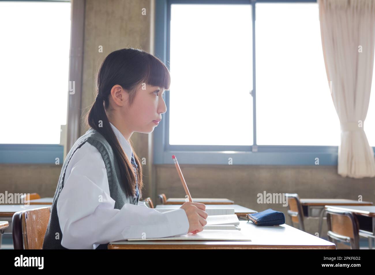 Junior High School Girl Studying in Classroom Stock Photo - Alamy