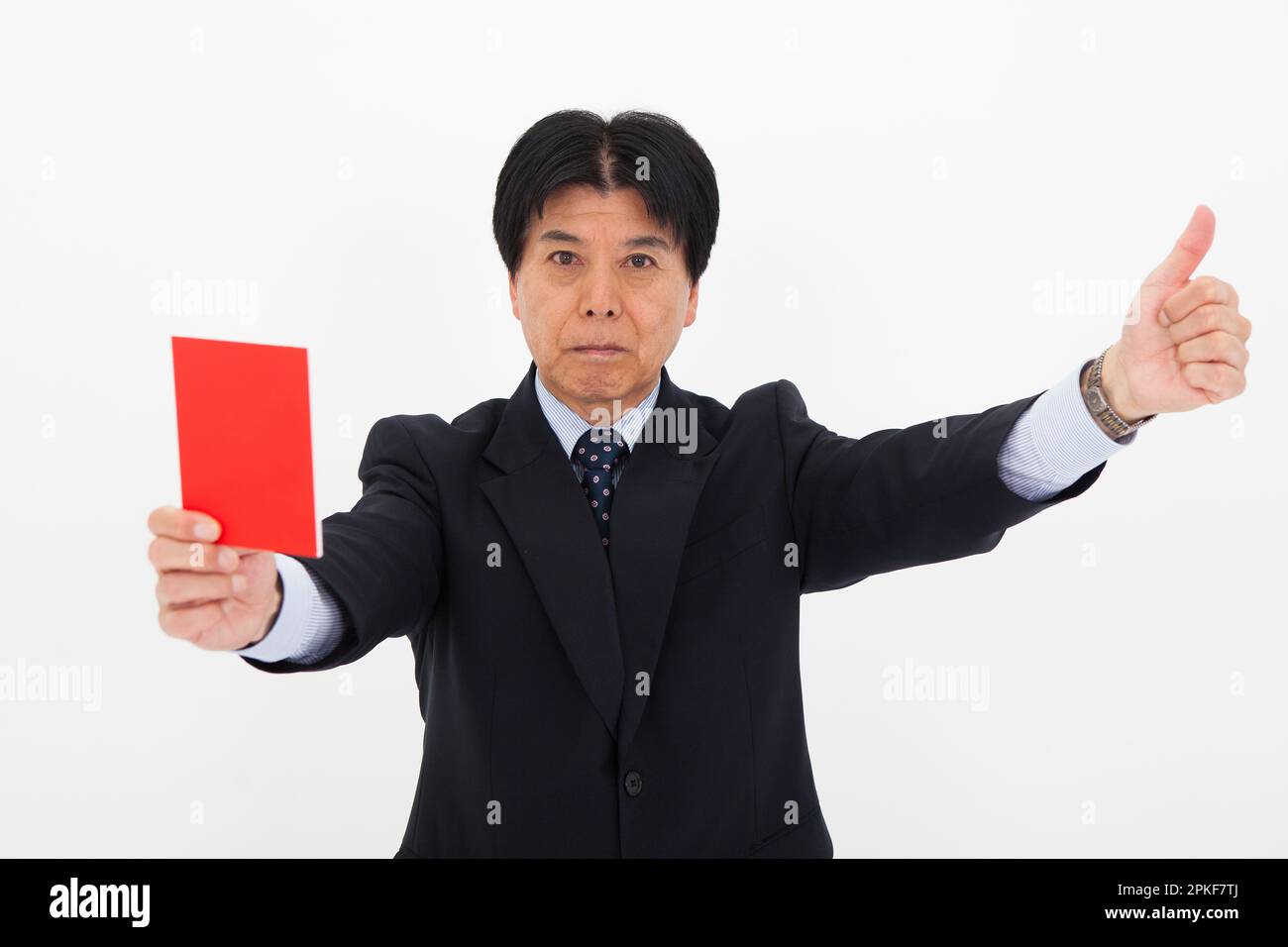 Man giving red card Stock Photo Alamy