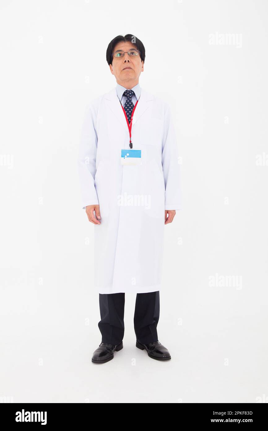 Man in white coat Stock Photo Alamy