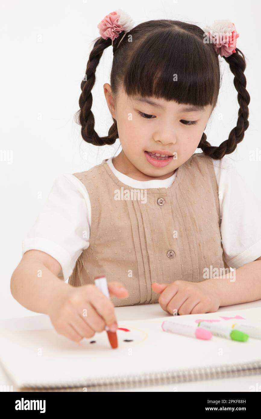 Girl Painting Stock Photo
