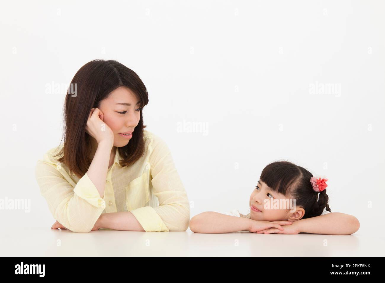 Smiling Woman and Girl Stock Photo