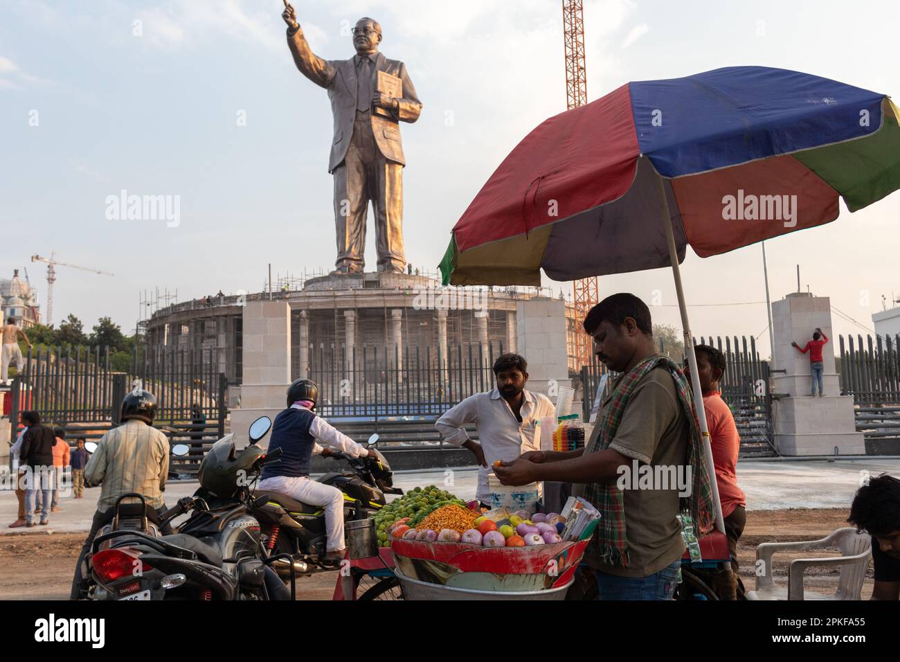 Hyderabad, India.7th April, 2023. A street vendor attends to customers
