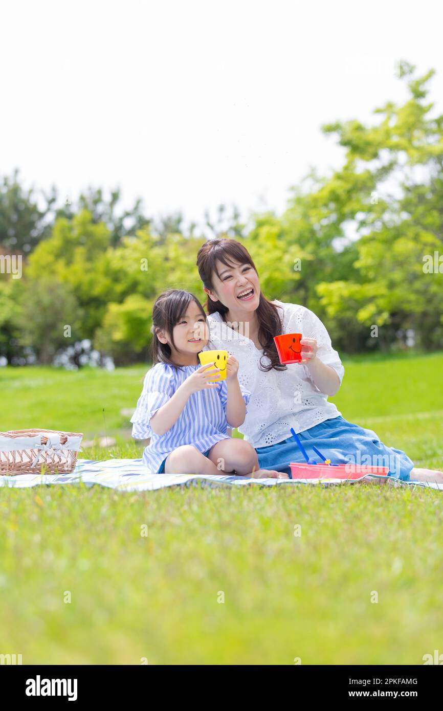 Mother and daughter having a picnic Stock Photo
