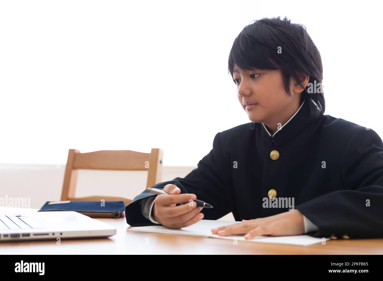 Junior high school students studying at home Stock Photo - Alamy