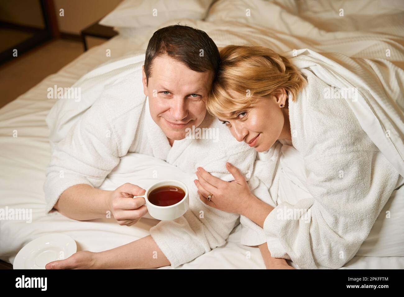 Middle aged couple in bed hi-res stock photography and images - Alamy