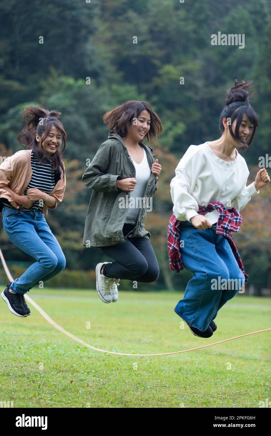 Women Jumping Rope Stock Photo