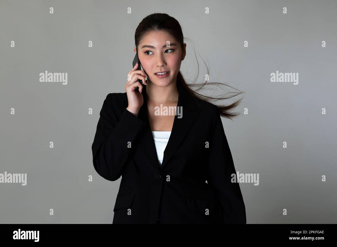 Portrait of Woman in Suit Stock Photo