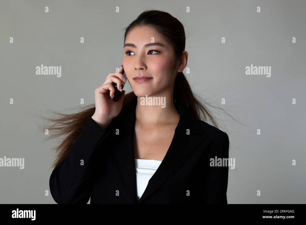 Portrait of Woman in Suit Stock Photo