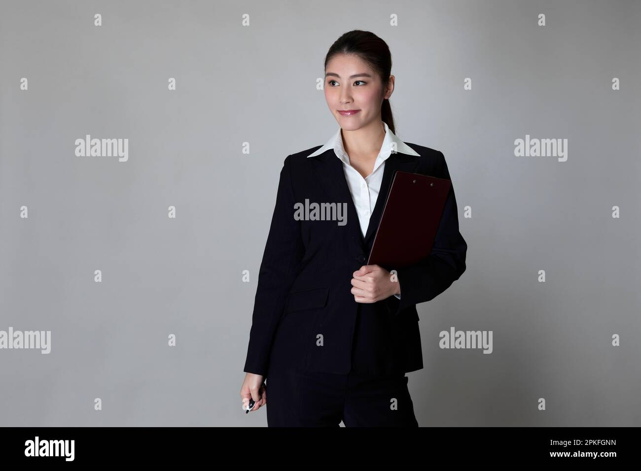 Portrait of Woman in Suit Stock Photo - Alamy