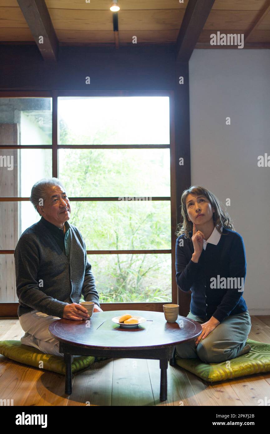 A senior couple who spend time in a country house Stock Photo - Alamy