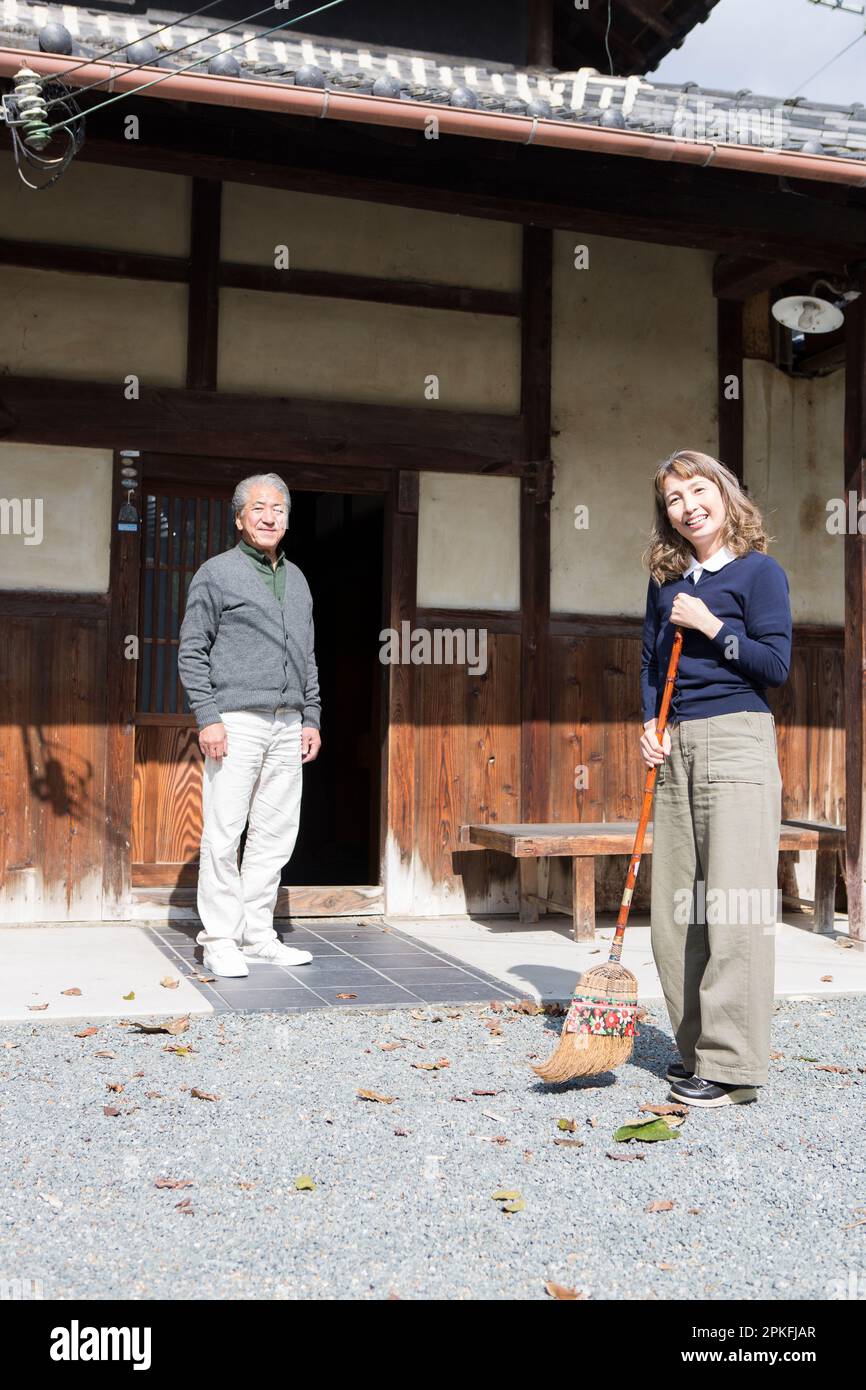 Senior couple spending time in country house Stock Photo - Alamy