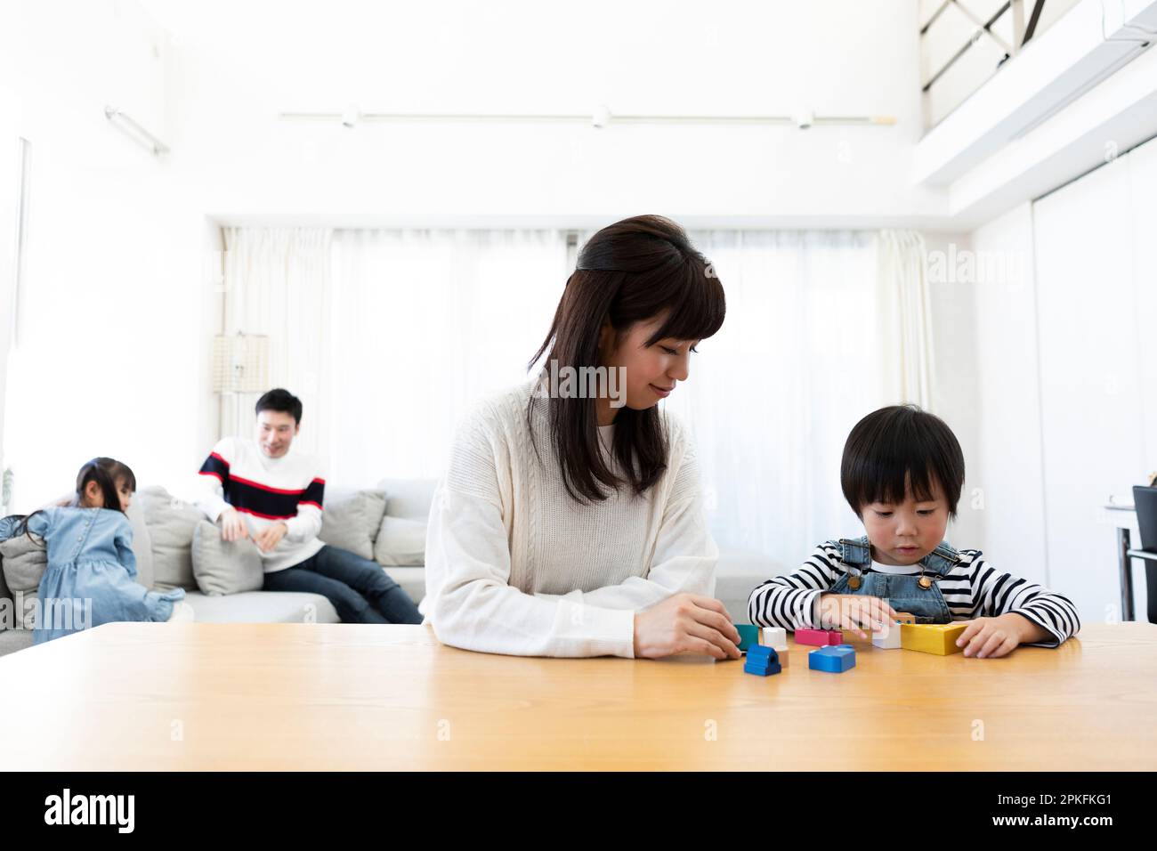 Boy playing with blocks Stock Photo - Alamy