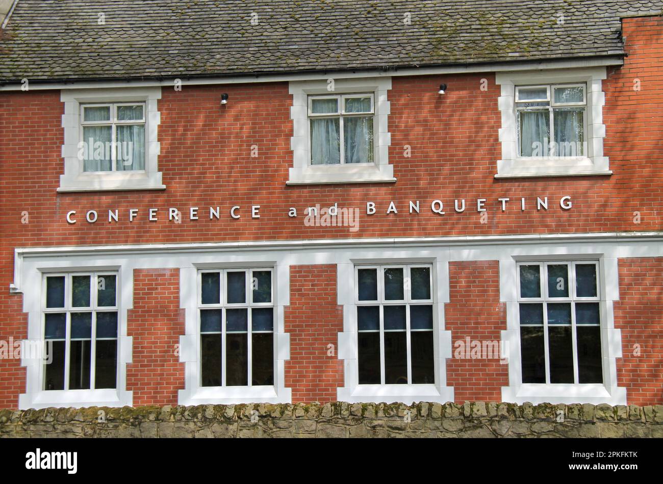 A Building Sign for a Conference and Banqueting Centre. Stock Photo