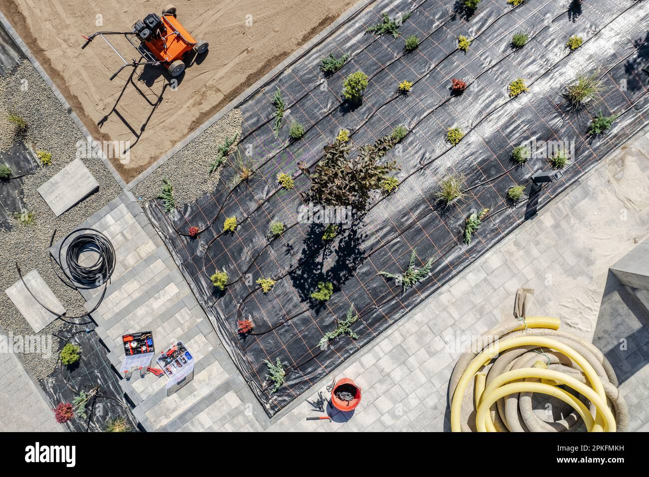Back Yard Garden Drip Irrigation System Building Aerial View. Rockery