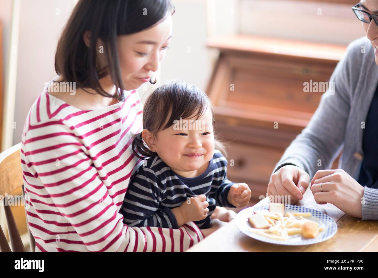Family eating a snack Stock Photo