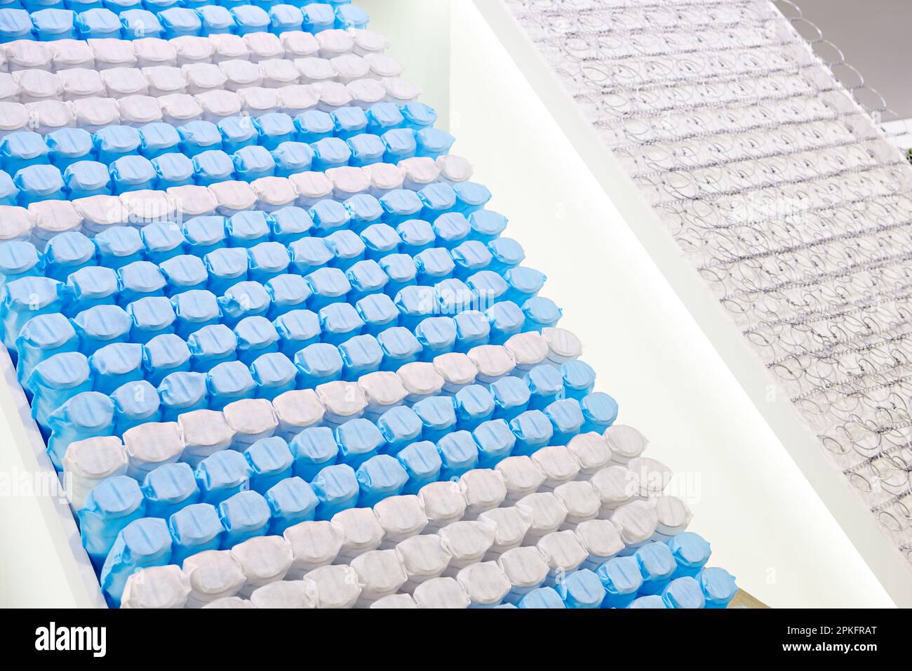 Springs of a modern mattress on exhibition Stock Photo
