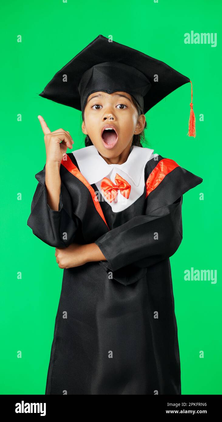 Graduation, surprise and child point on green screen for graduate ...
