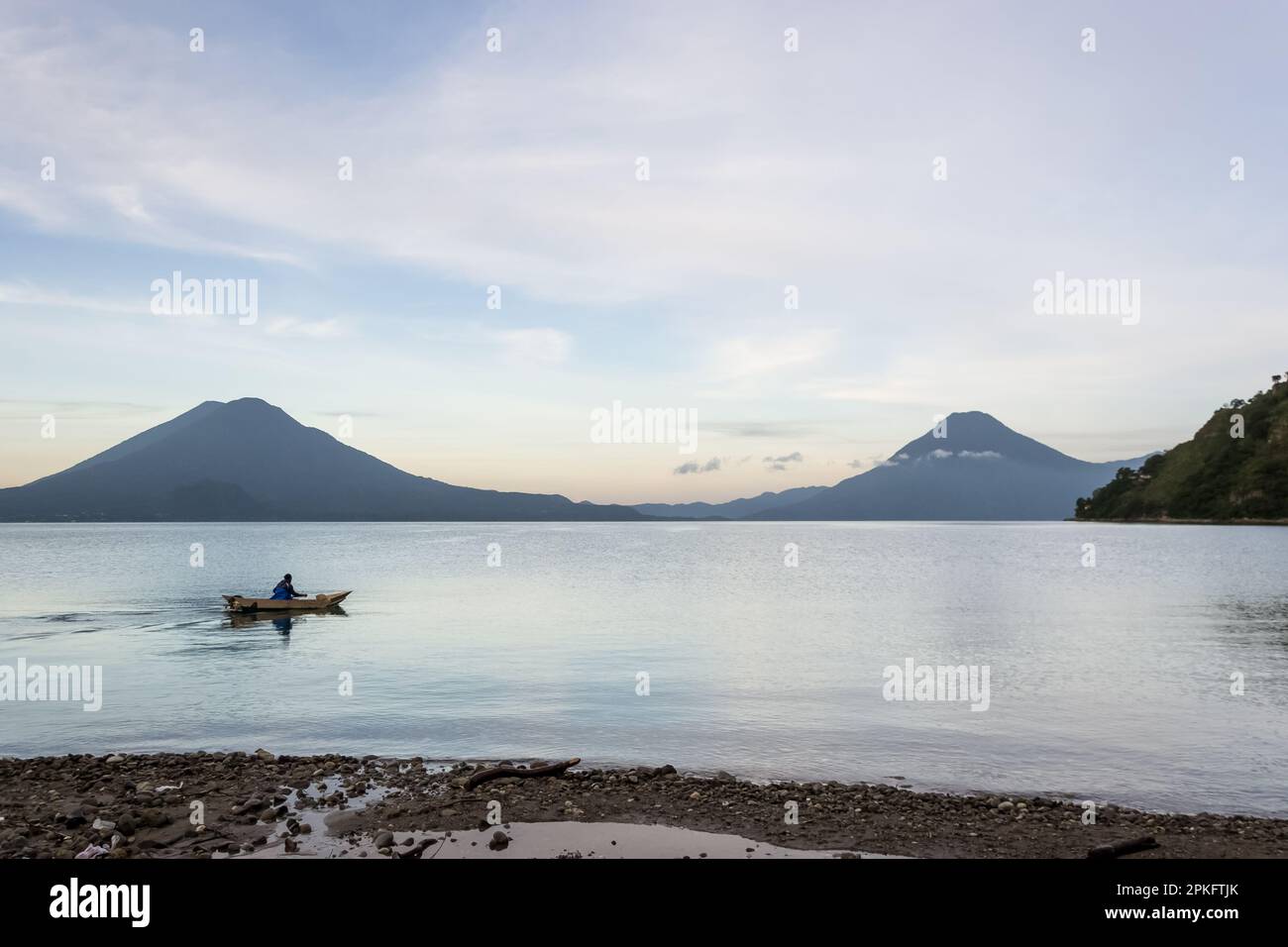 Breathtaking Landscape of Lake Atitlán in the Guatemalan Highlands, nestled in the Sierra Madre mountain range, is a massive volcanic crater Stock Photo