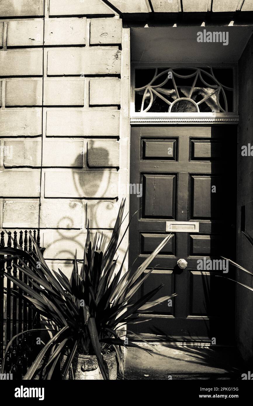 Shadow of a Street lamp outside a Townhouse in Bath