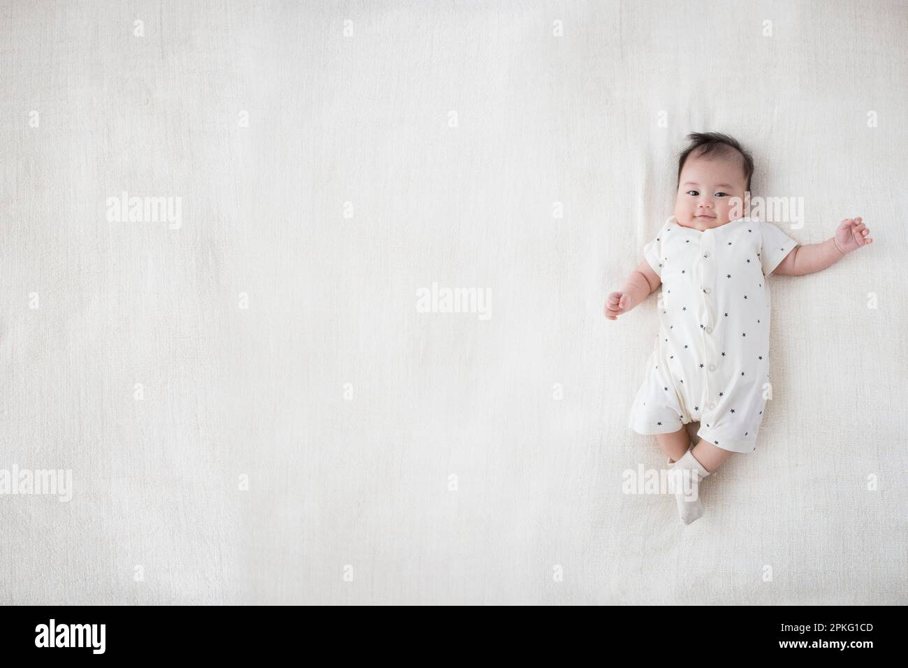 Sleeping asian baby full body hi-res stock photography and images - Alamy