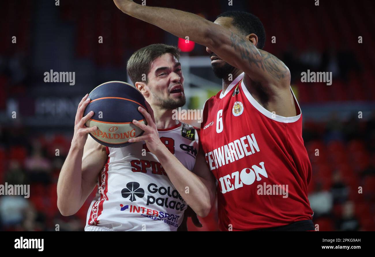 Charleroi, Belgium. 07th Apr, 2023. Spirou's Rafael Lisboa and Leeuwarden's Jason Dourisseau fight for the ball during a basketball match between Spirou Charleroi (Belgium) and Aris Leeuwarden (Netherlands), Friday 07 April 2023 in Charleroi, on day 6 (out of 10) in the elite Gold, cross-boarder phase of the 'BNXT League' Belgian and Netherlands first division basket championship. BELGA PHOTO VIRGINIE LEFOUR Credit: Belga News Agency/Alamy Live News Stock Photo