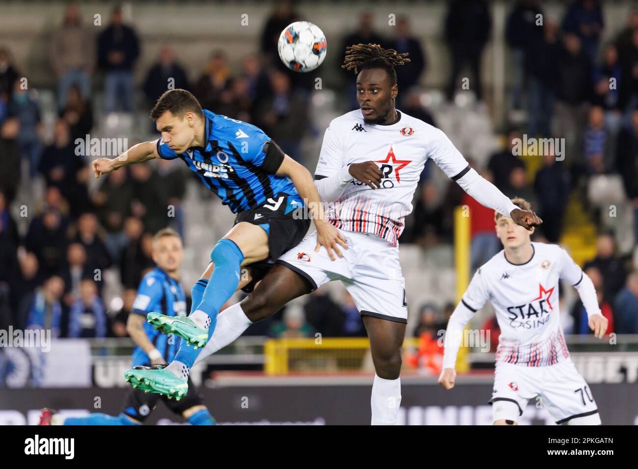 Brugge, Belgium. 07th Apr, 2023. Club's Ferran Jutgla and Seraing's Marvin Silver Tshibuabua fight for the ball during a soccer match between Club Brugge KV and RFC Seraing, Friday 07 April 2023 in Brugge, on day 32 of the 2022-2023 'Jupiler Pro League' first division of the Belgian championship. BELGA PHOTO KURT DESPLENTER Credit: Belga News Agency/Alamy Live News Stock Photo