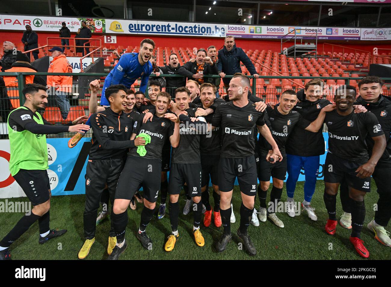 players of Deinze pictured celebrating after winning a soccer game