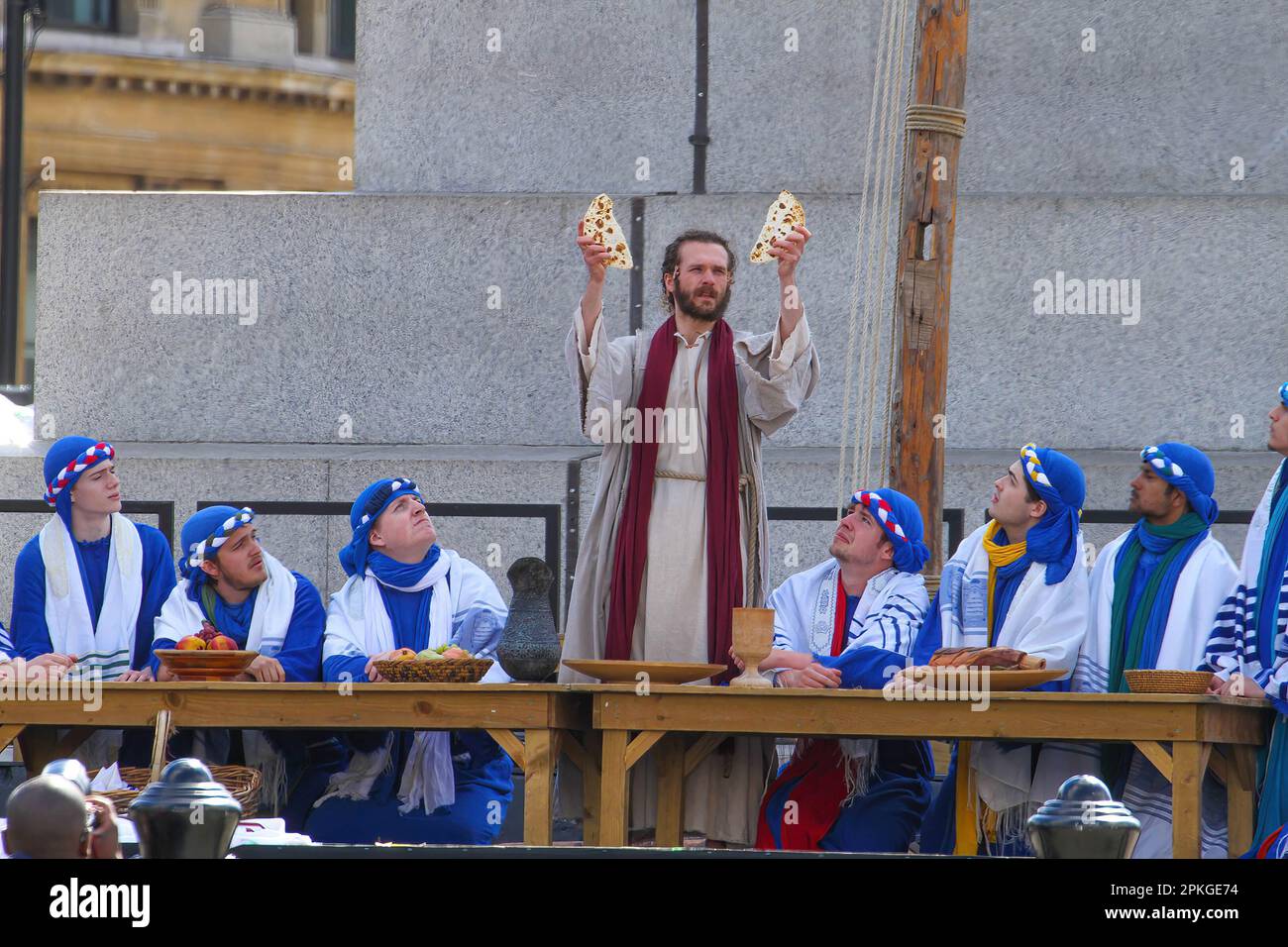 London, UK. 07th Apr, 2023. Jesus breaks the bread during the passover feast with his disiples. The Wintershall players based in Surry have for 11 years taken the Passion of Christ to thousands of people in Trafalgar Square on Good Friday. Credit: SOPA Images Limited/Alamy Live News Stock Photo