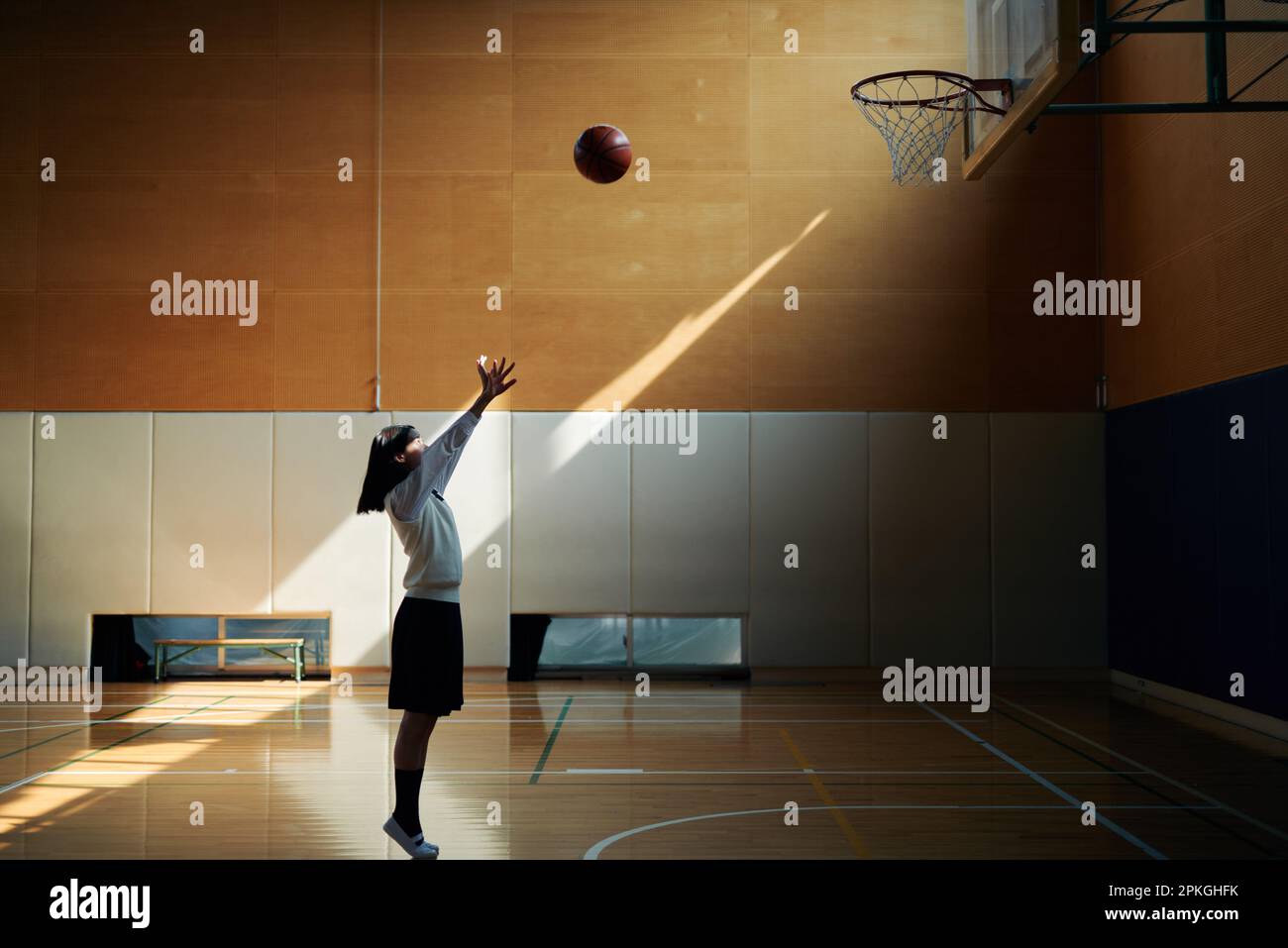 High school girls playing basketball in the gym Stock Photo Alamy