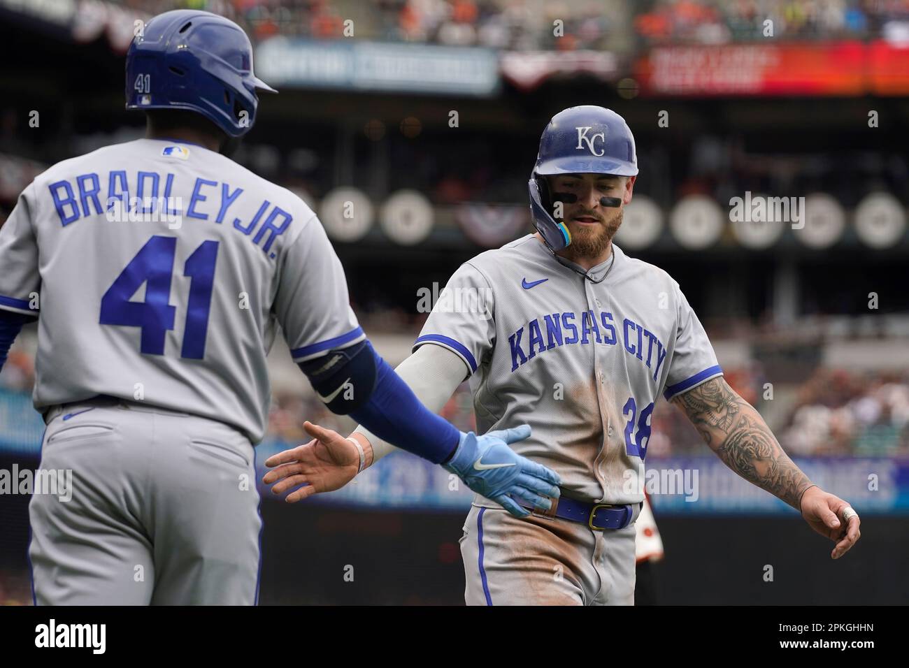 Kansas City Royals' Kyle Isbel, right, is congratulated by Jackie
