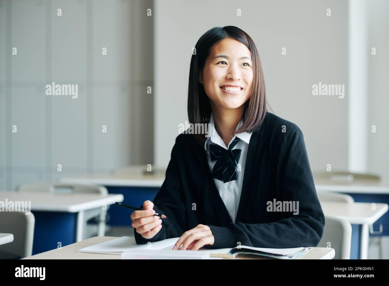 High school girls studying in a classroom Stock Photo - Alamy