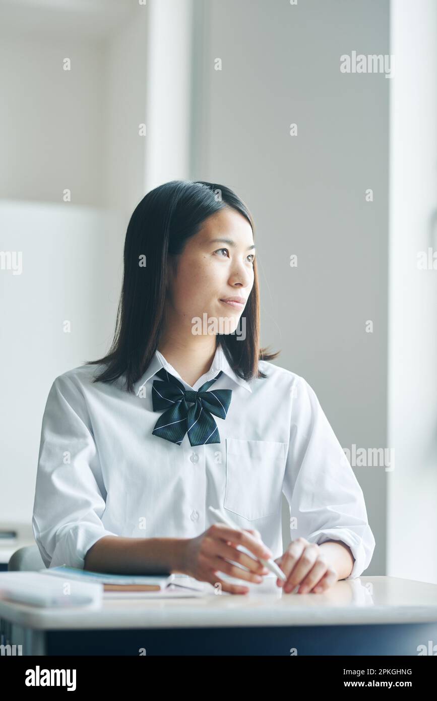 High school girls studying in a classroom Stock Photo - Alamy