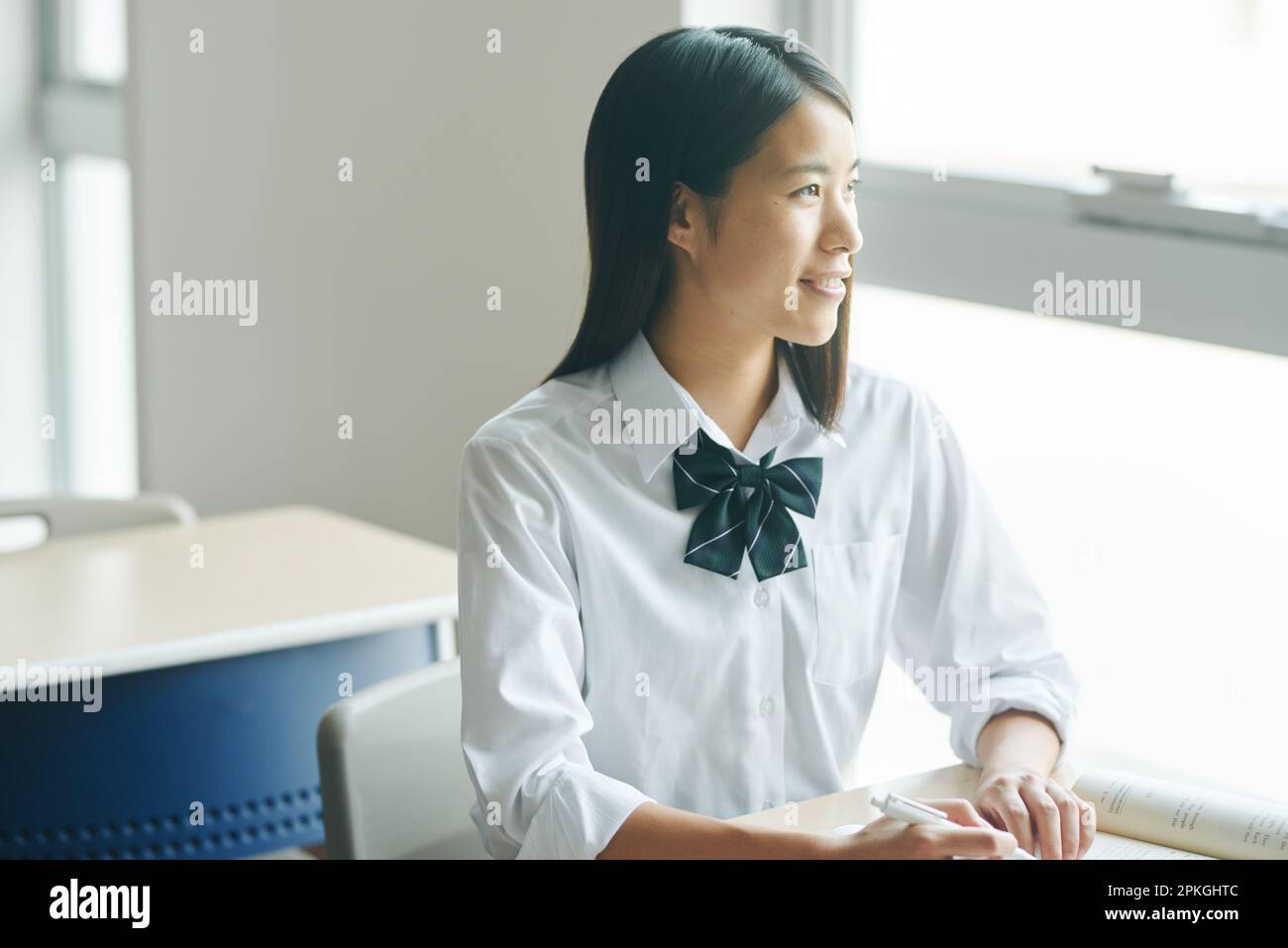 High school girls studying in a classroom Stock Photo - Alamy