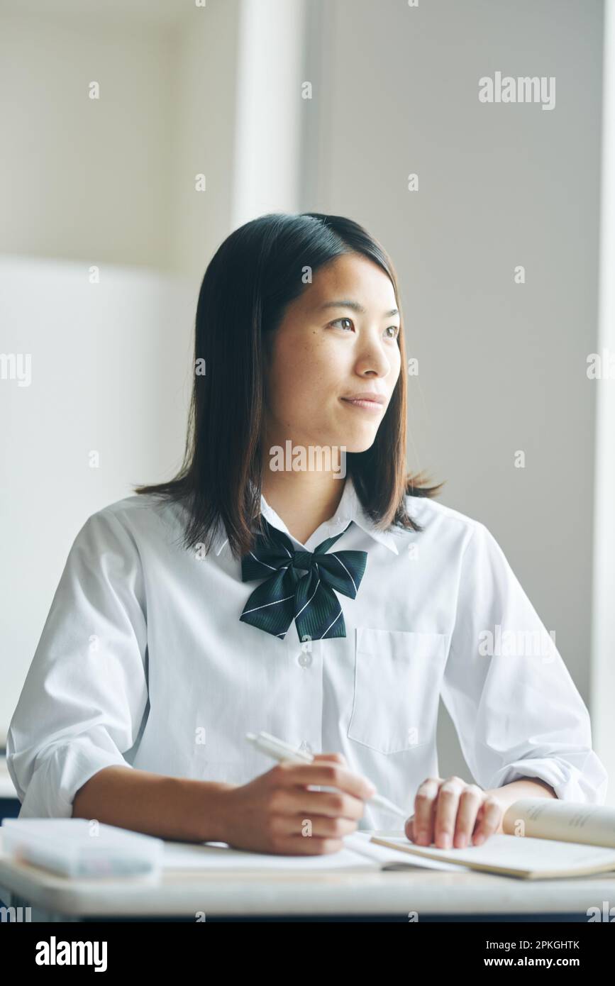 High school girls studying in a classroom Stock Photo - Alamy