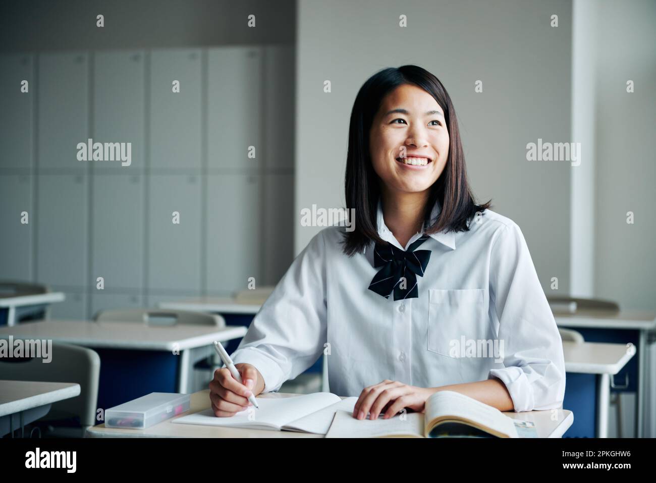 High school girls studying in a classroom Stock Photo - Alamy