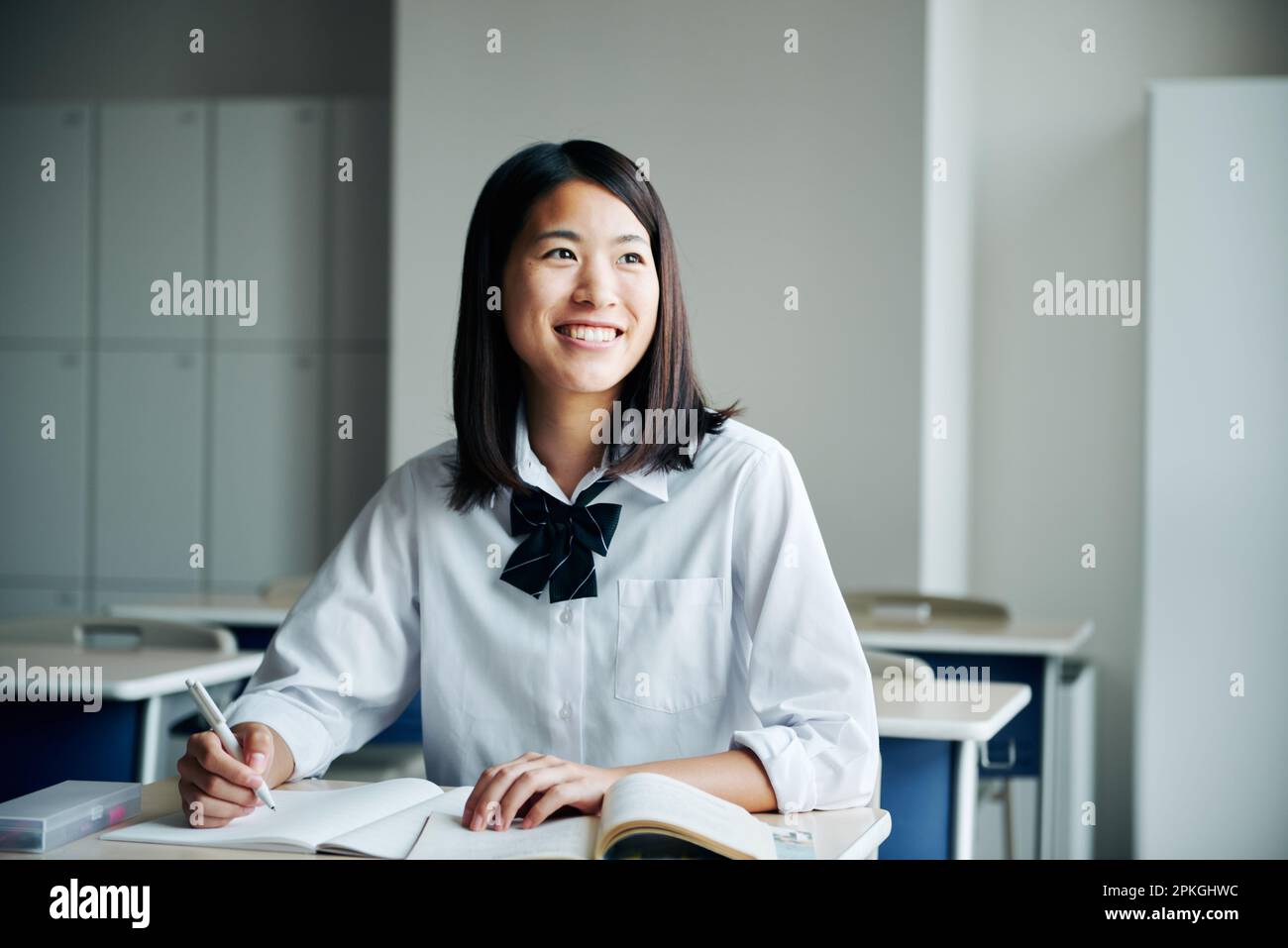 High school girls studying in a classroom Stock Photo - Alamy