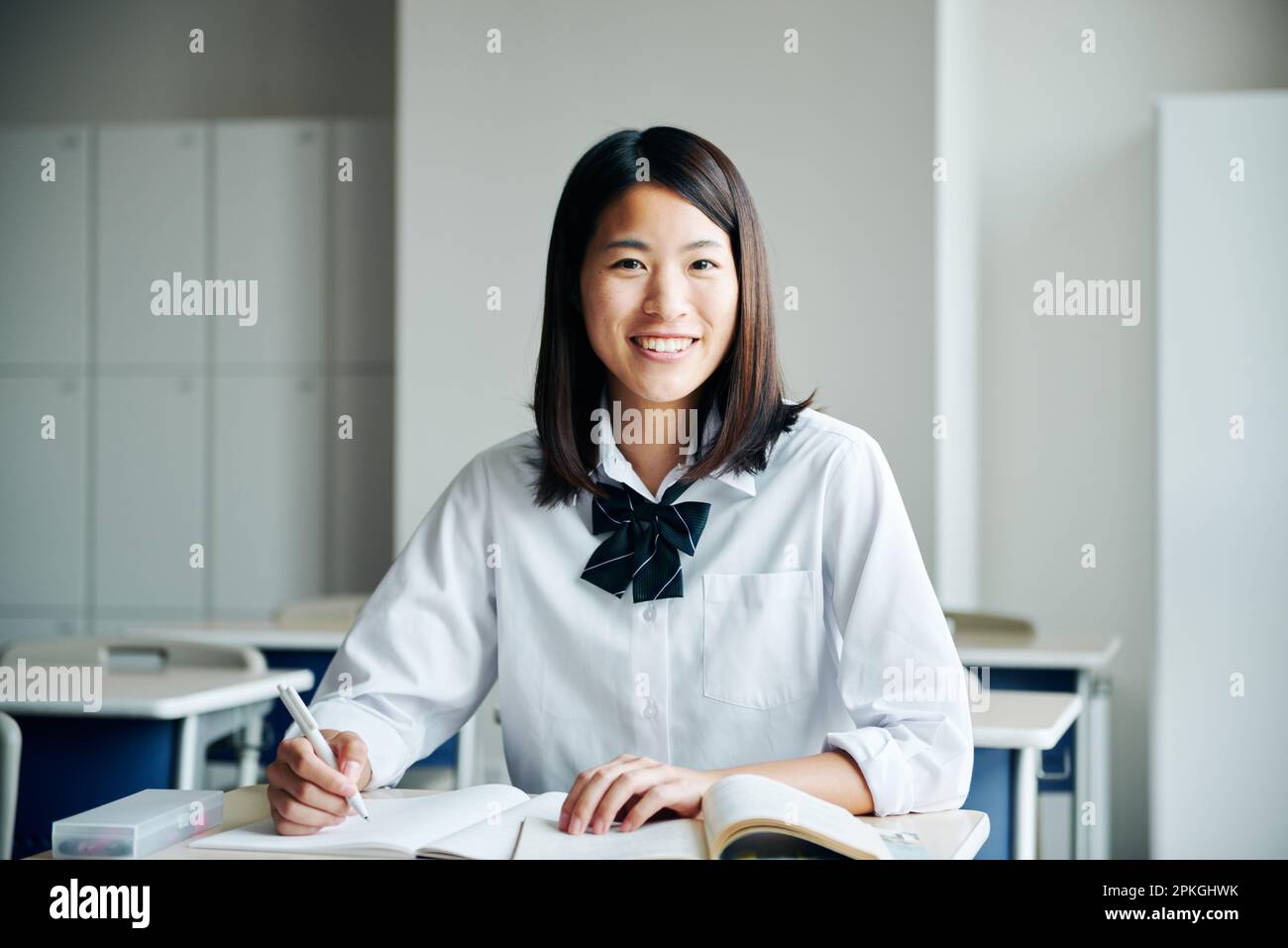 High school girls studying in a classroom Stock Photo - Alamy