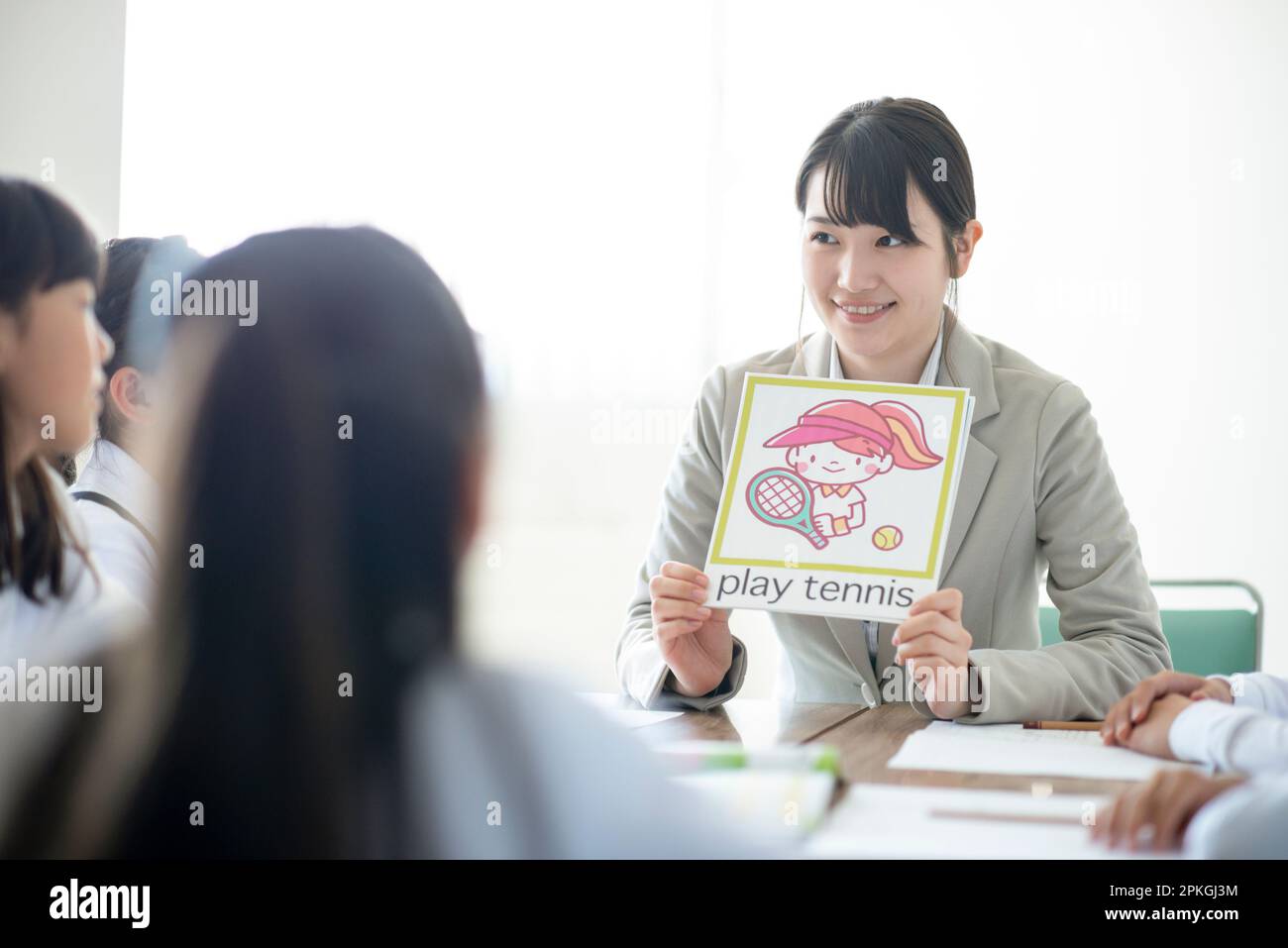 Teachers who teach english to elementary school students stock photo