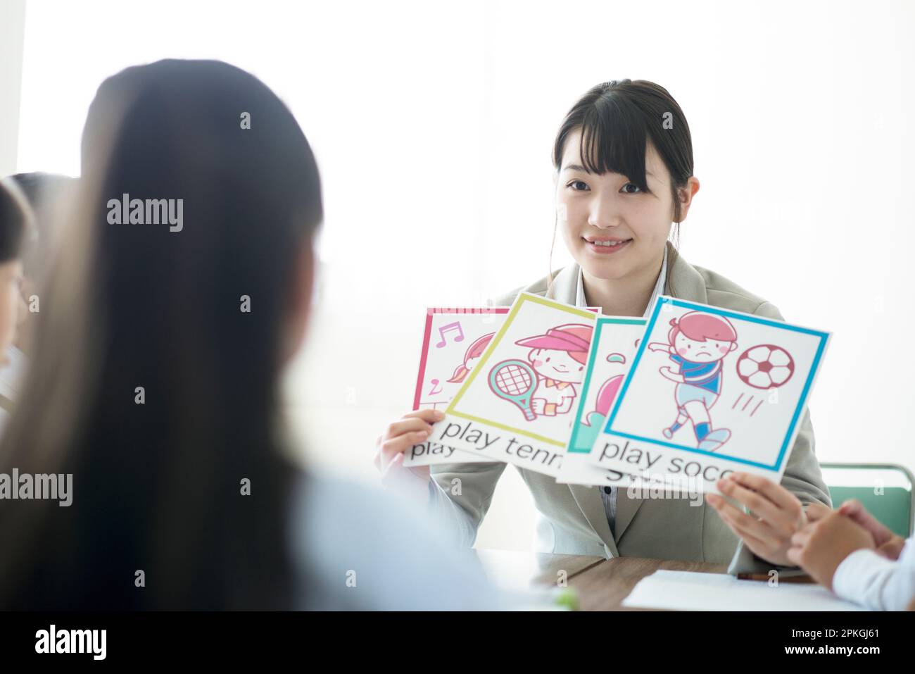 Teachers who teach english to elementary school students stock photo