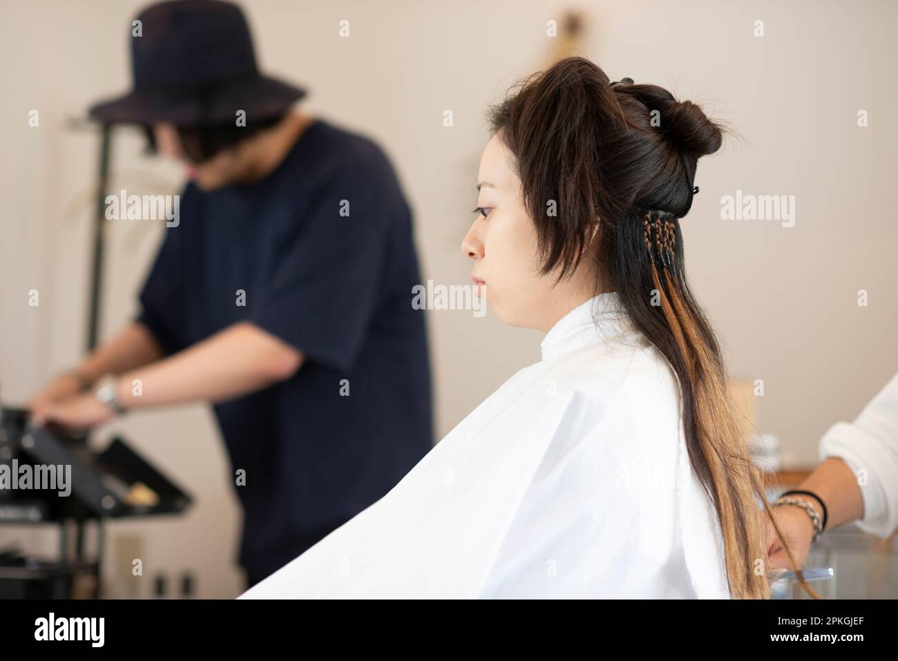Woman getting extensions Stock Photo