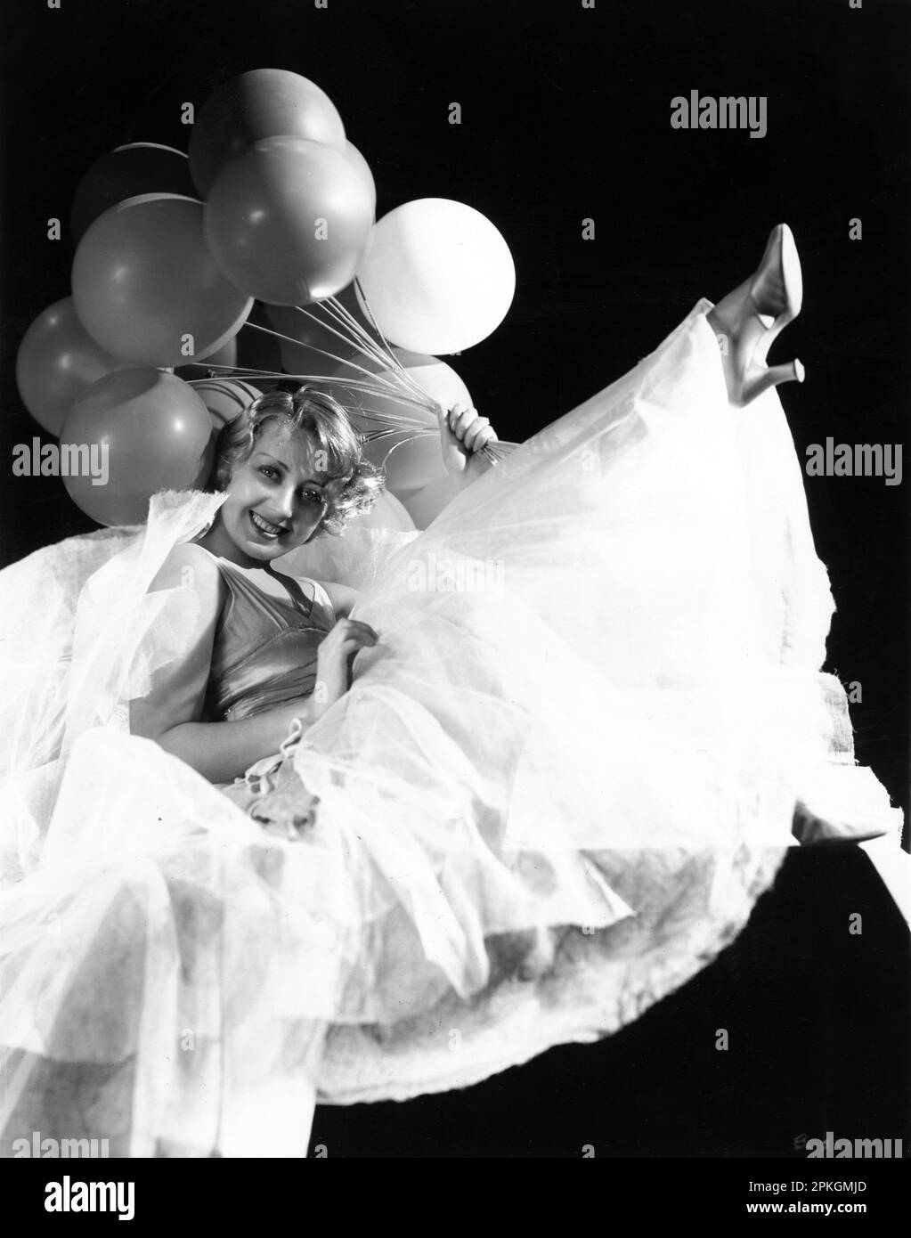 JOAN BLONDELL 1933 pose with balloons publicity for Warner Bros. Stock Photo