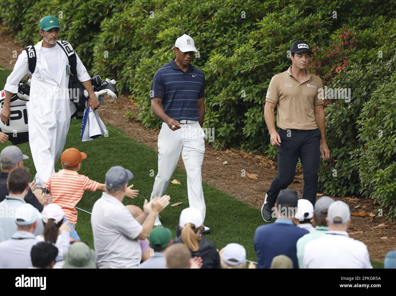 Augusta, United States. 07th Apr, 2023. Tiger Woods (C) and Viktor Hovland (R) walk to the 6th hole during the second round at the Masters tournament at Augusta National Golf Club in Augusta, Georgia on Friday, April 7, 2023. Photo by John Angelillo/UPI Credit: UPI/Alamy Live News Stock Photo