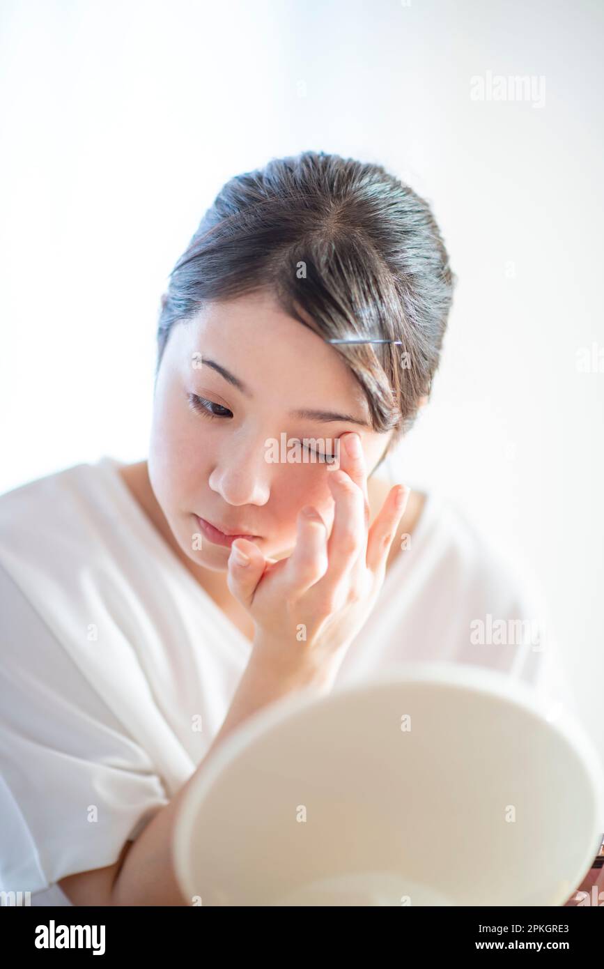 Women Doing Makeup Stock Photo