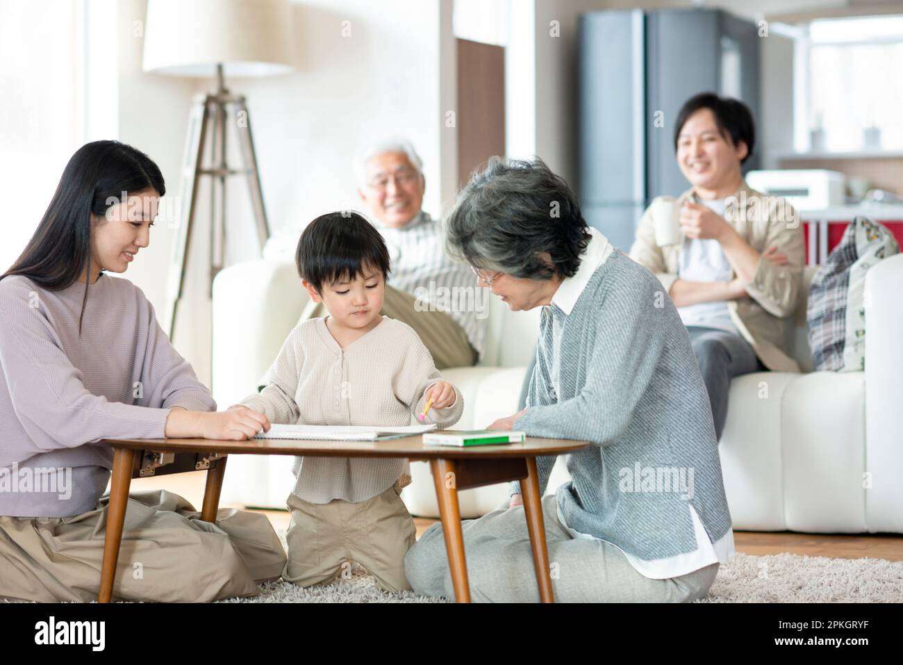 Family of 3 generations drawing Stock Photo