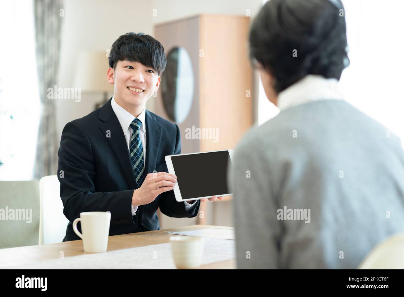 Rear view businessman security hi-res stock photography and images - Alamy