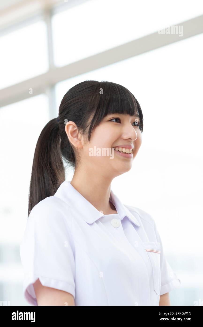 Nursing student smiling Stock Photo