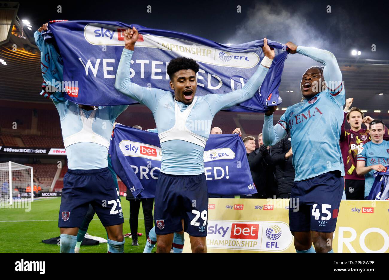 Burnley's Nathan Tella, Vitinho and Michael Obafemi celebrate promotion to the Premier League following the Sky Bet Championship match at the Riverside Stadium, Middlesbrough. Picture date: Friday April 7, 2023. Stock Photo